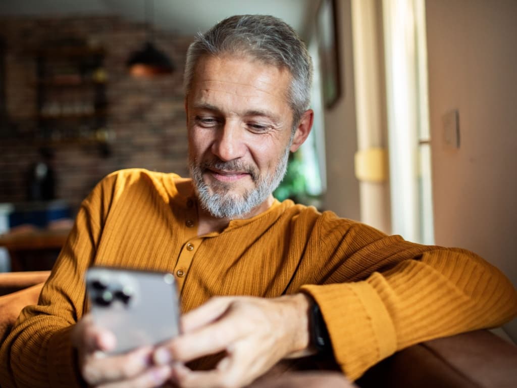 Man holding his phone.