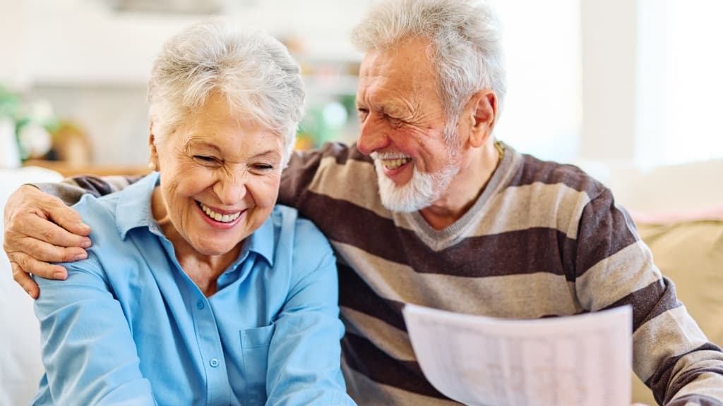 Happy active senior couple.